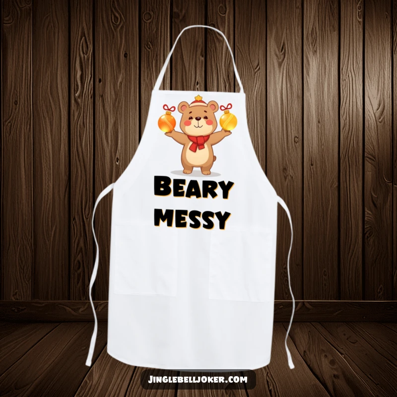 Funny apron showing a smug, happy bear character juggling glowing Christmas baubles, adding humorous and festive flair to kitchen activities.