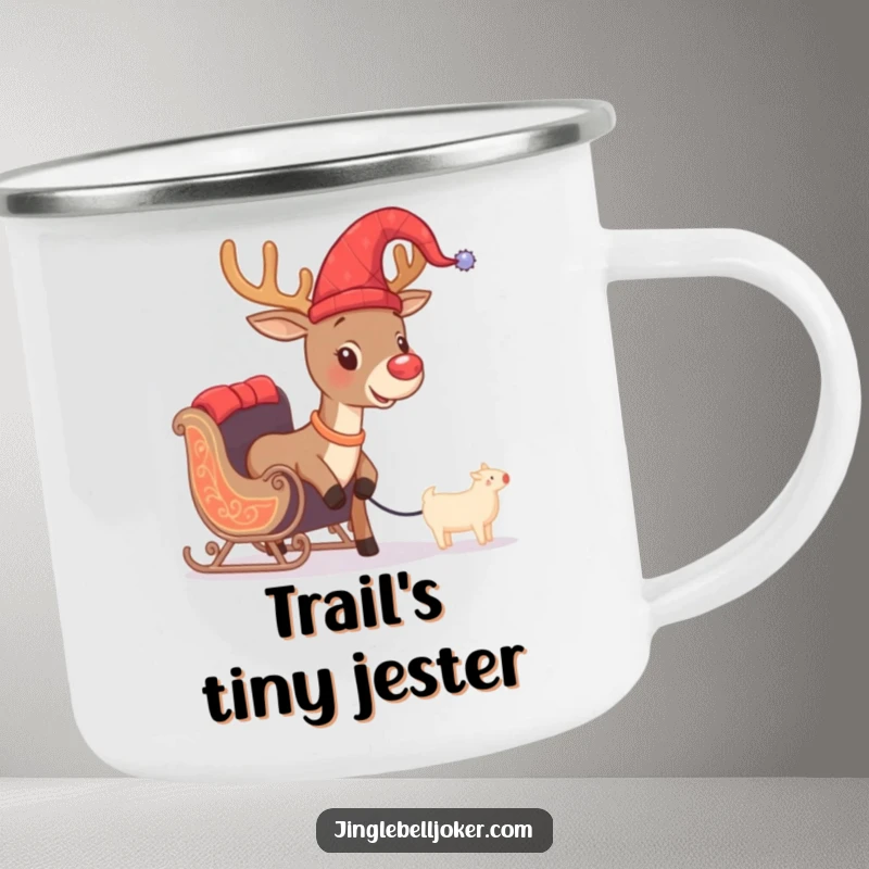 Funny camping mug featuring a brave reindeer with a jester hat, hilariously attempting to pull a miniature sleigh, for outdoor holiday fun.