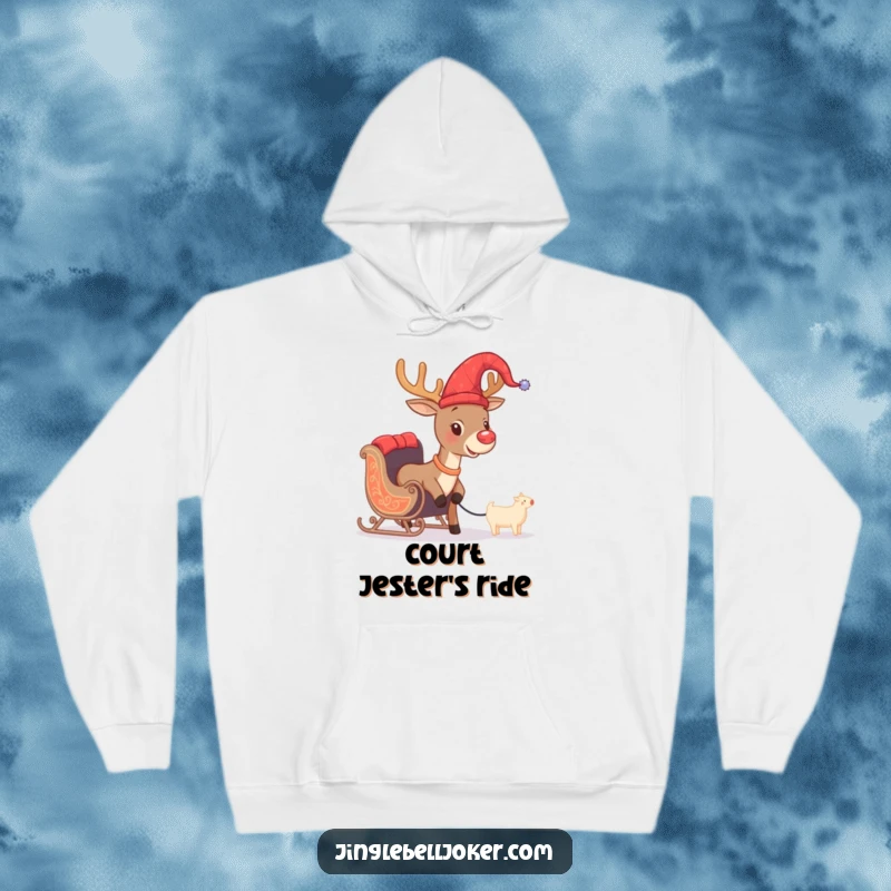 Funny Christmas hoodie showcasing a brave reindeer sporting a jester hat, humorously attempting to pull a tiny sleigh, perfect for cozy laughs.